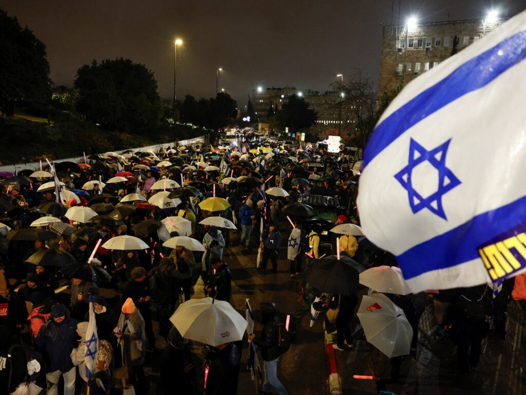 Analysis: Israelis protest as Netanyahu focuses on securing political power | Politics News