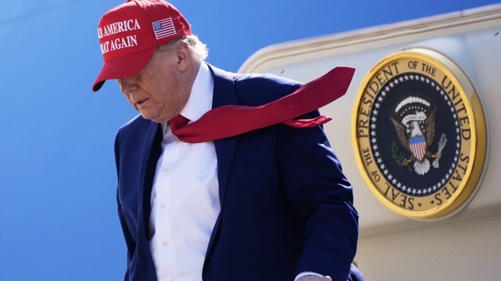 Trump hugs Michigan Gov. Gretchen Whitmer ahead of new jet announcement