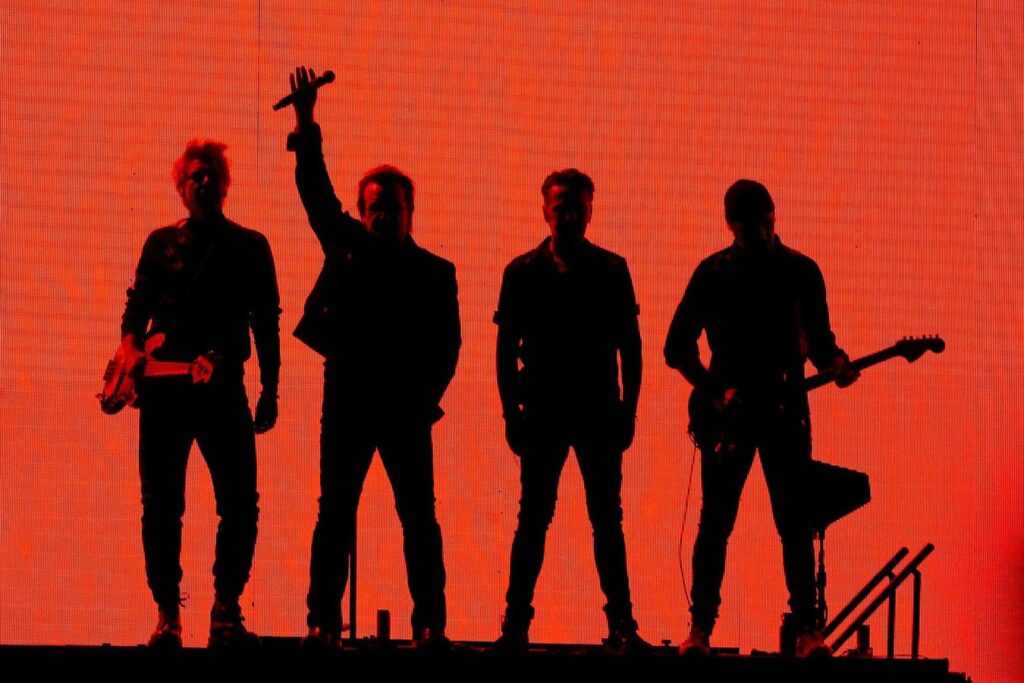 U2 Returns As Bono Earns His First Solo Smash