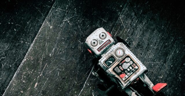 Russian AI Robot Faceplants During Grand Moscow Unveiling, Flails Helplessly on Ground