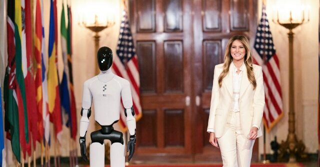 Fashion Notes: Melania Trump Struts Alongside Robot in Dolce & Gabbana
